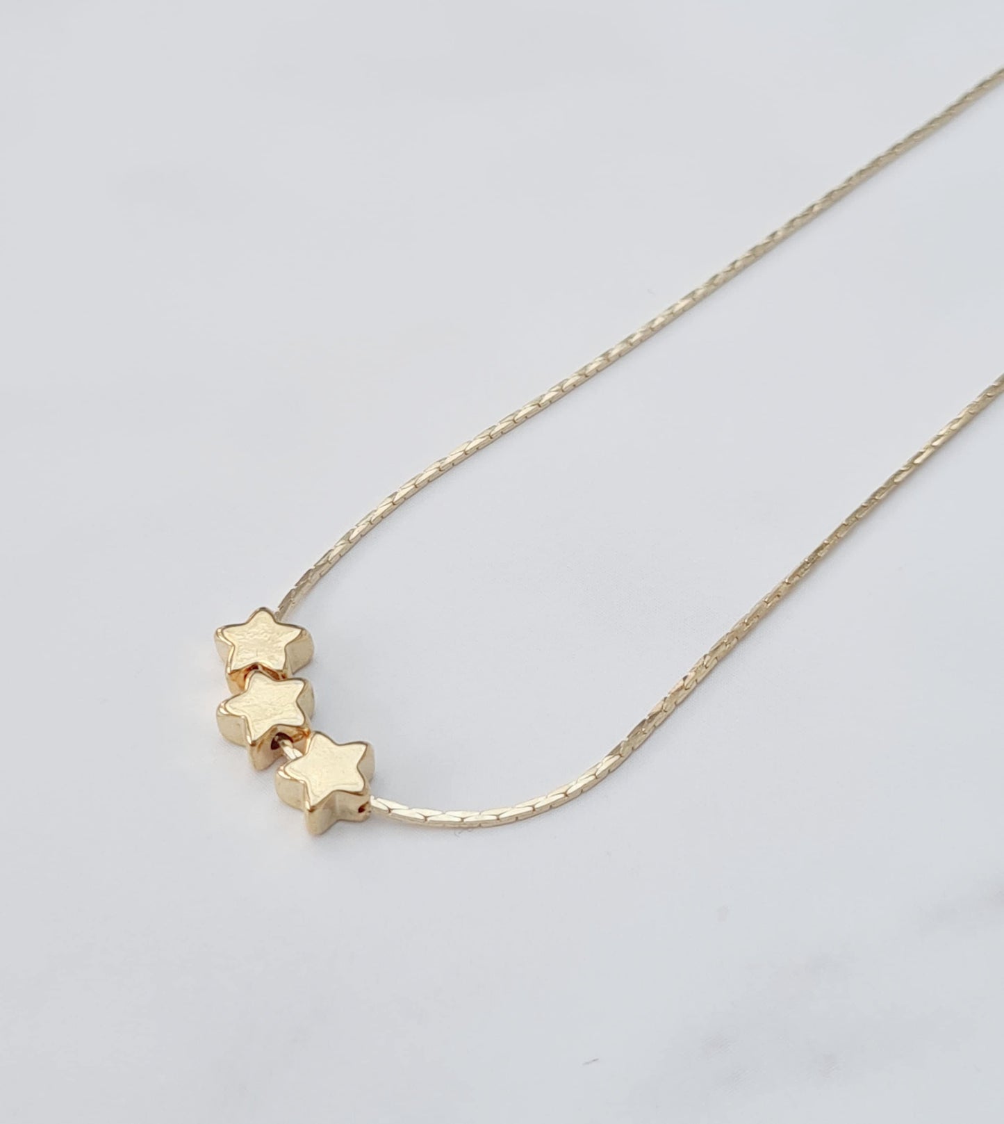 Triple Golden Star Necklace