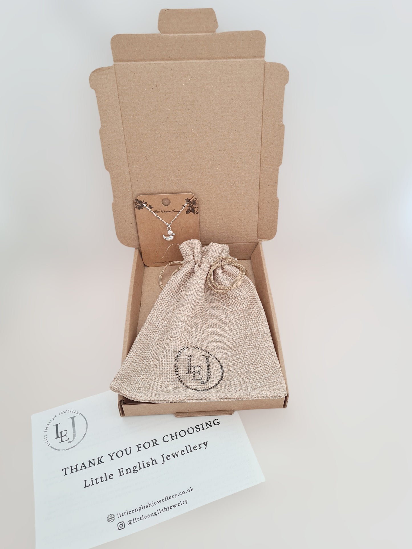 Leaf Pendant with a Pearl Charm Necklace